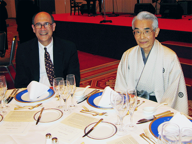 Picture of Prof. Shibasaki in Kimono and his best friend, Prof. Mark Hallett, at a Gala Dinner